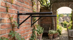 Gravity Fitness wall mounted dips bar fixed to a wall for calisthenics dip training